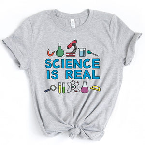Science is Real Adult T-Shirt - feminist doodles